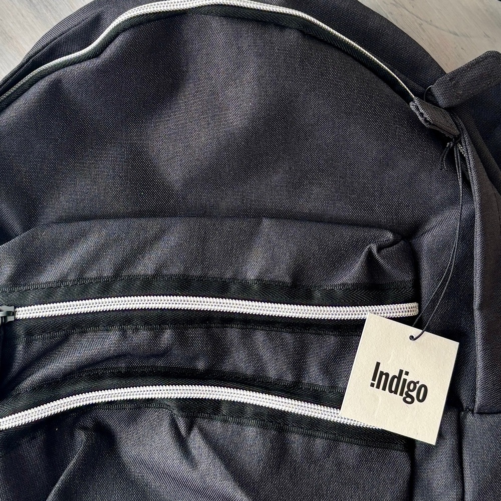 NWT Black Unisex BackPack with Multiple Front Side Zippers. NEW ❤️ with Tags.